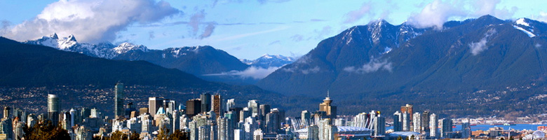 Site header image of the city of Vancouver and the mountains in the background